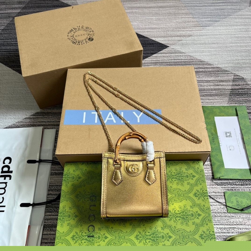 G*u*i top handle bags